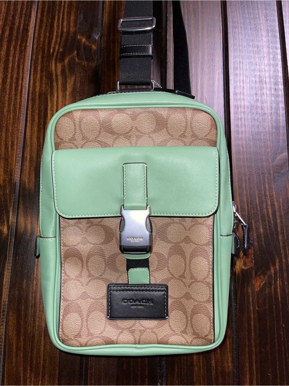 Coach Men’s Signature Canvas Sling Bag in Mint and Khaki